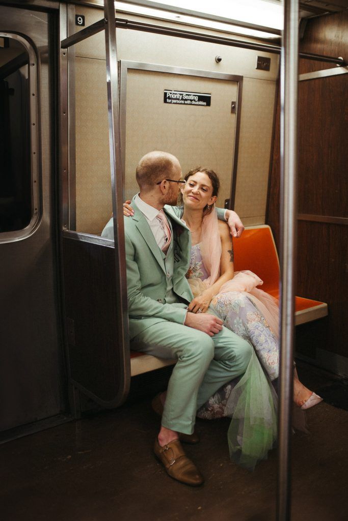 Bride and groom in nyc subway - by Lucie B. Photo brooklyn wedding photographer
