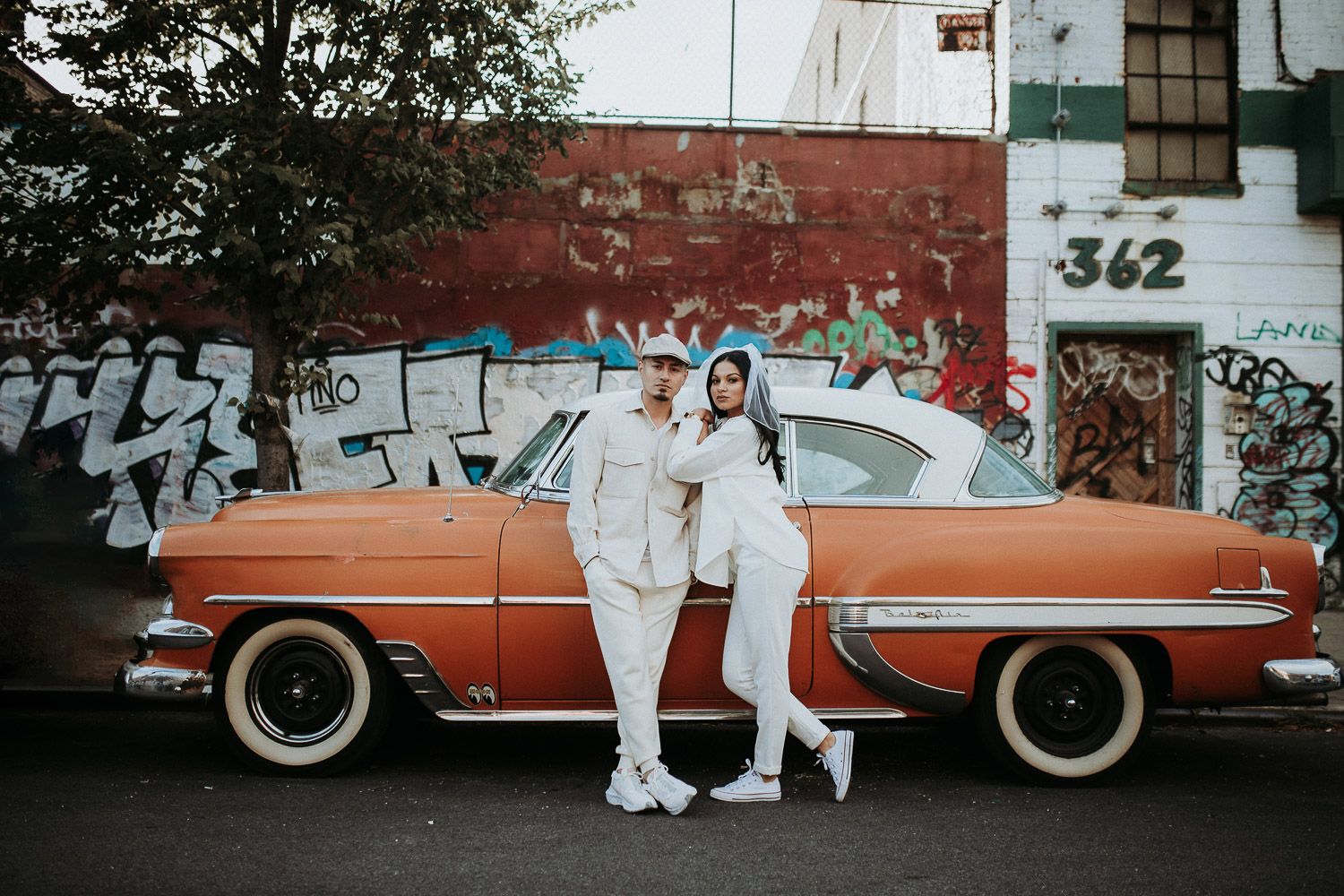 Couple during urban elopement in east williamsburg brooklyn