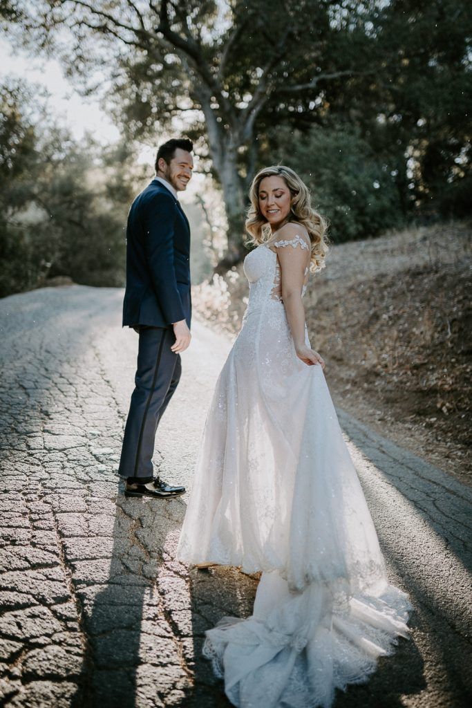 Bride and groom at golden hour in hills of los angeles