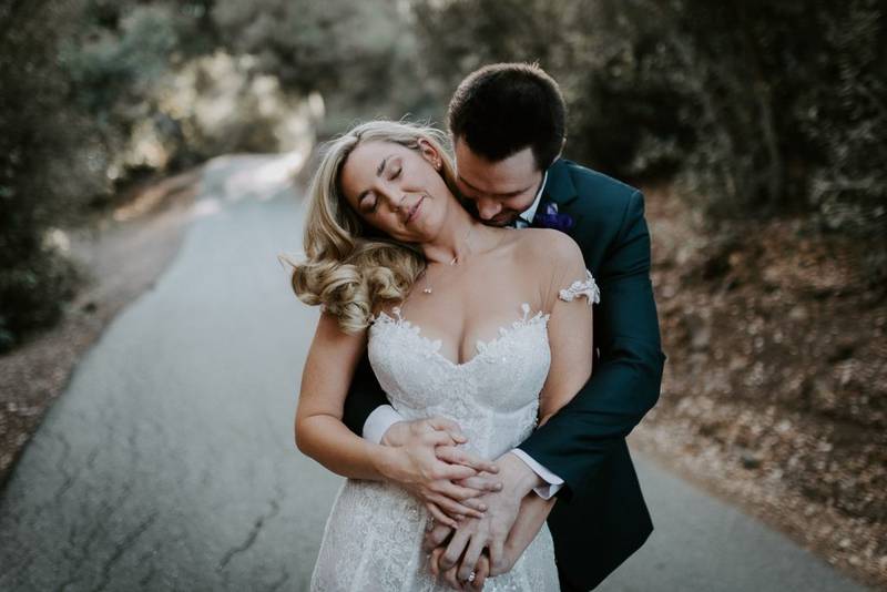 Bride and groom at golden hour in hills of los angeles