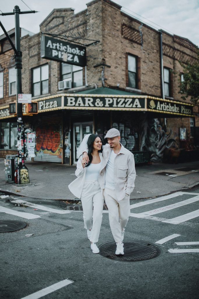 Couple during urban elopement in east williamsburg brooklyn