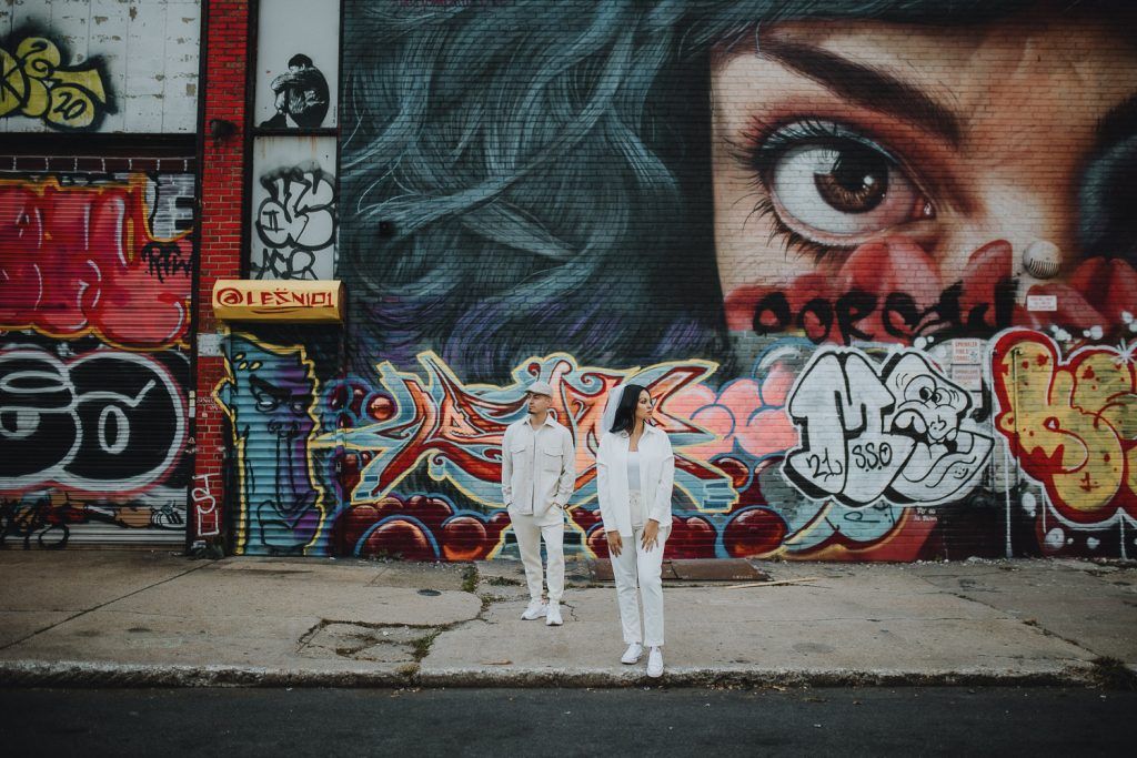 Couple during urban elopement in east williamsburg brooklyn