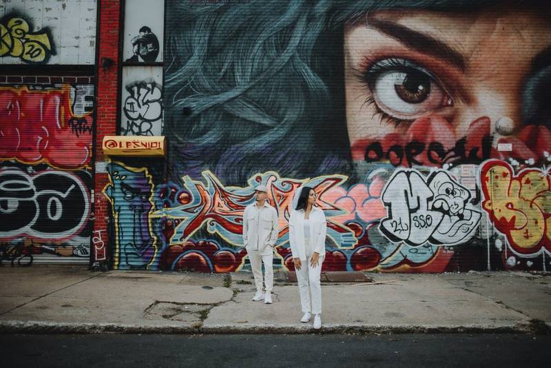 Couple during urban elopement in east williamsburg brooklyn
