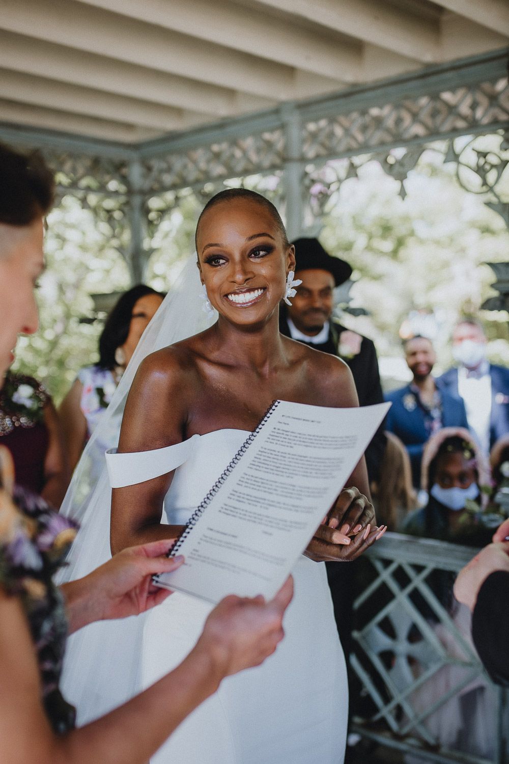 Bride cries during wedding ceremony in central park