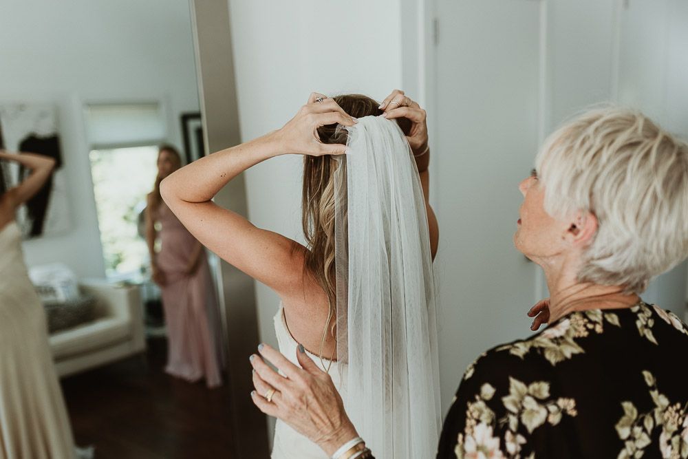 Bride getting ready before backyard wedding in the hamptons