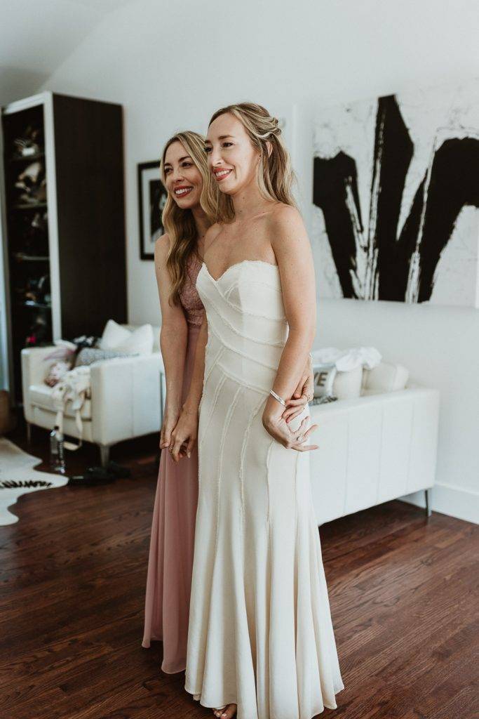 Bride getting ready before backyard wedding in the hamptons