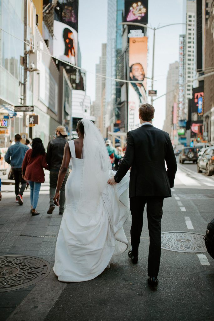 Interracial bride and groom at nyc wedding in time square