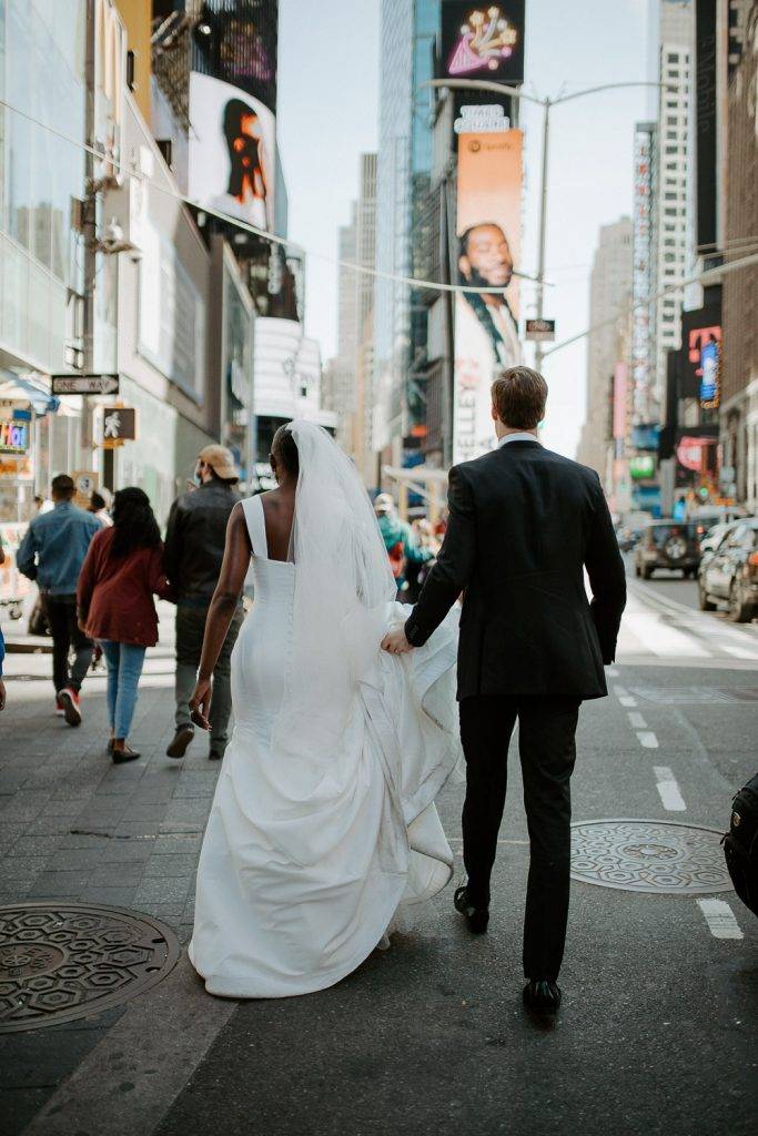 Interracial bride and groom at nyc wedding in time square
