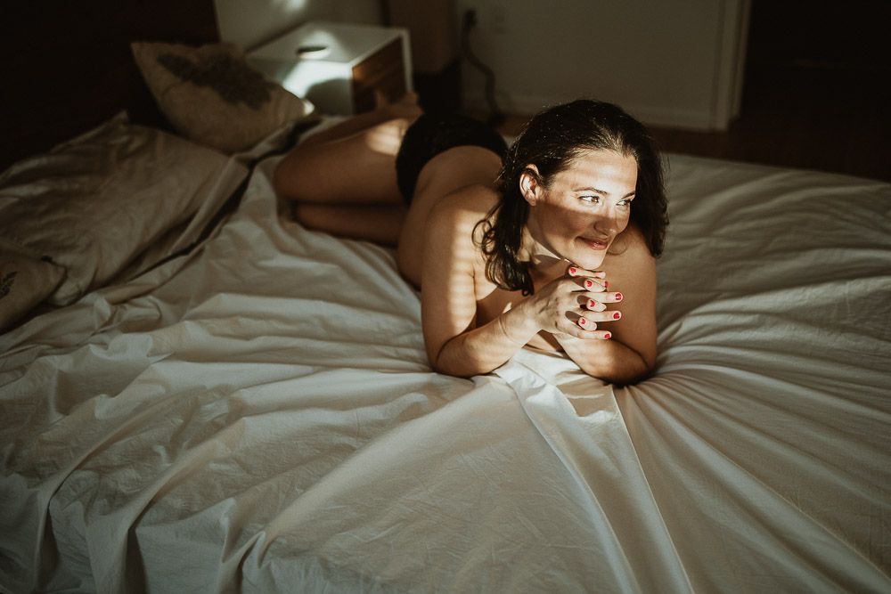Naked pregnant woman during maternity photoshoot at home in brooklyn