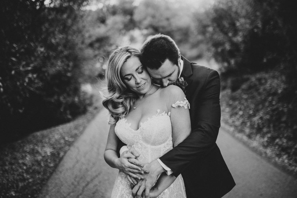 Bride and groom at golden hour in hills of los angeles