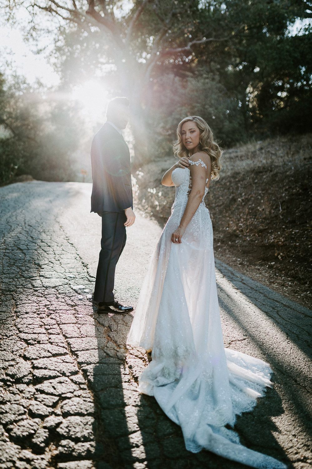 Bride and groom at golden hour in hills of los angeles