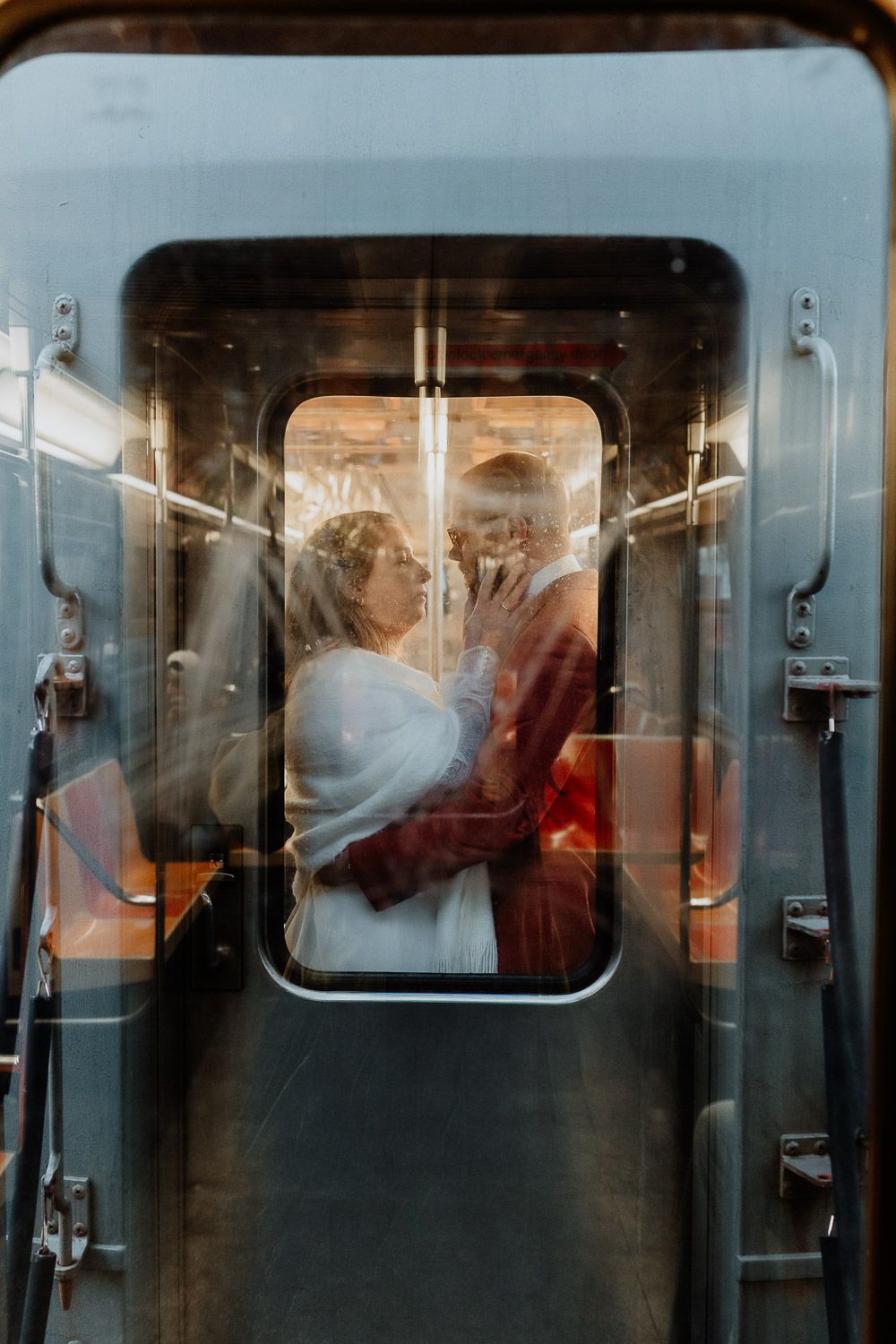 Bride and groom at nyc elopement in subway