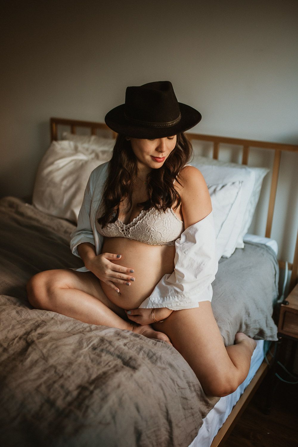 Pregnant woman during maternity photoshoot at home in brooklyn