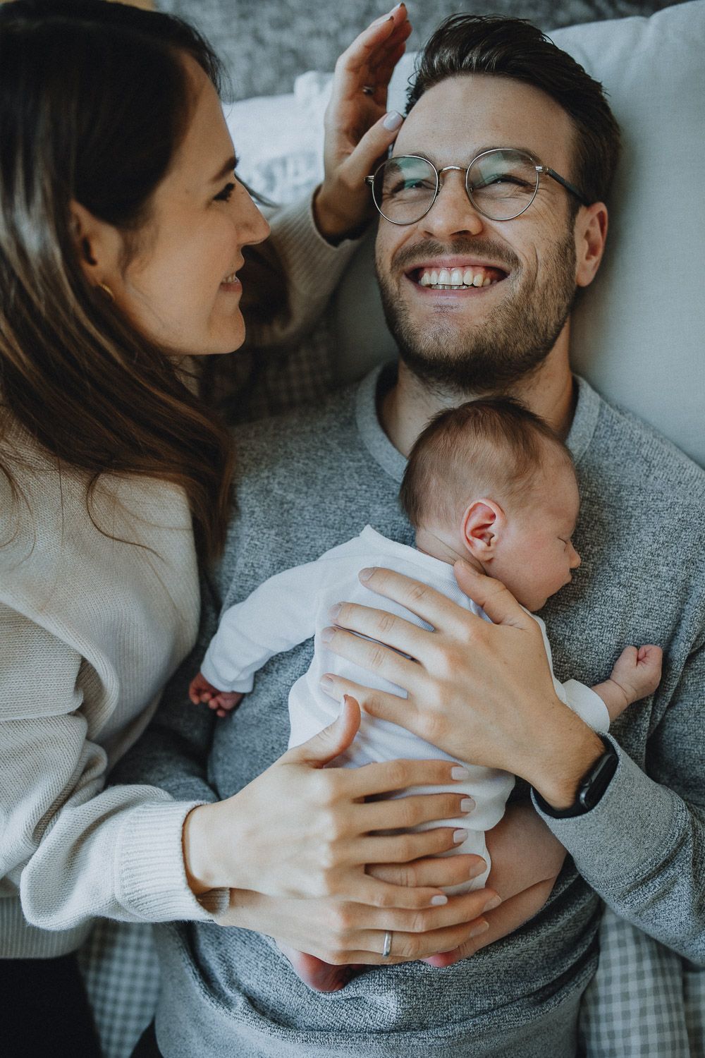 Parents and son during in home newborn photoshoot in nyc