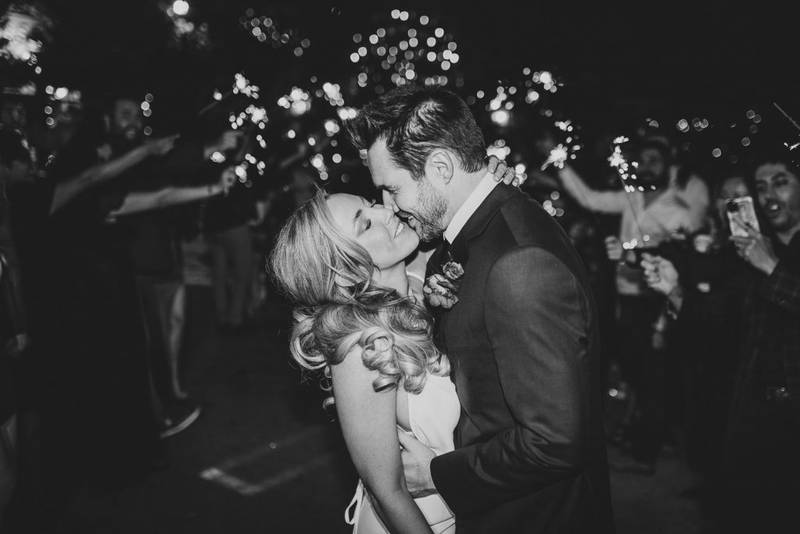 Bride and groom during sparklers exit at los angeles wedding