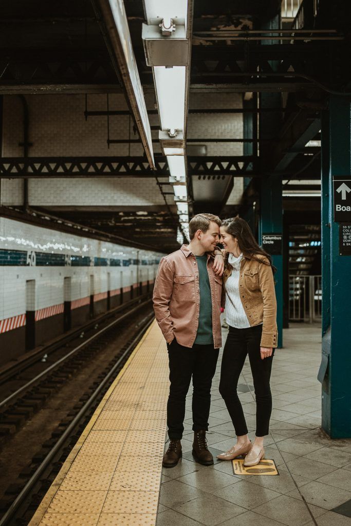 Couple during engagement shoot in the nyc subway