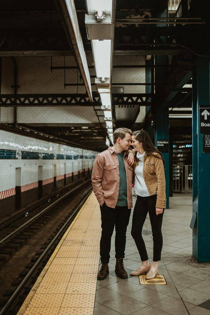 Couple during engagement shoot in the nyc subway