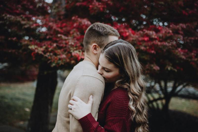 Couple during fall engagement photoshoot in west point