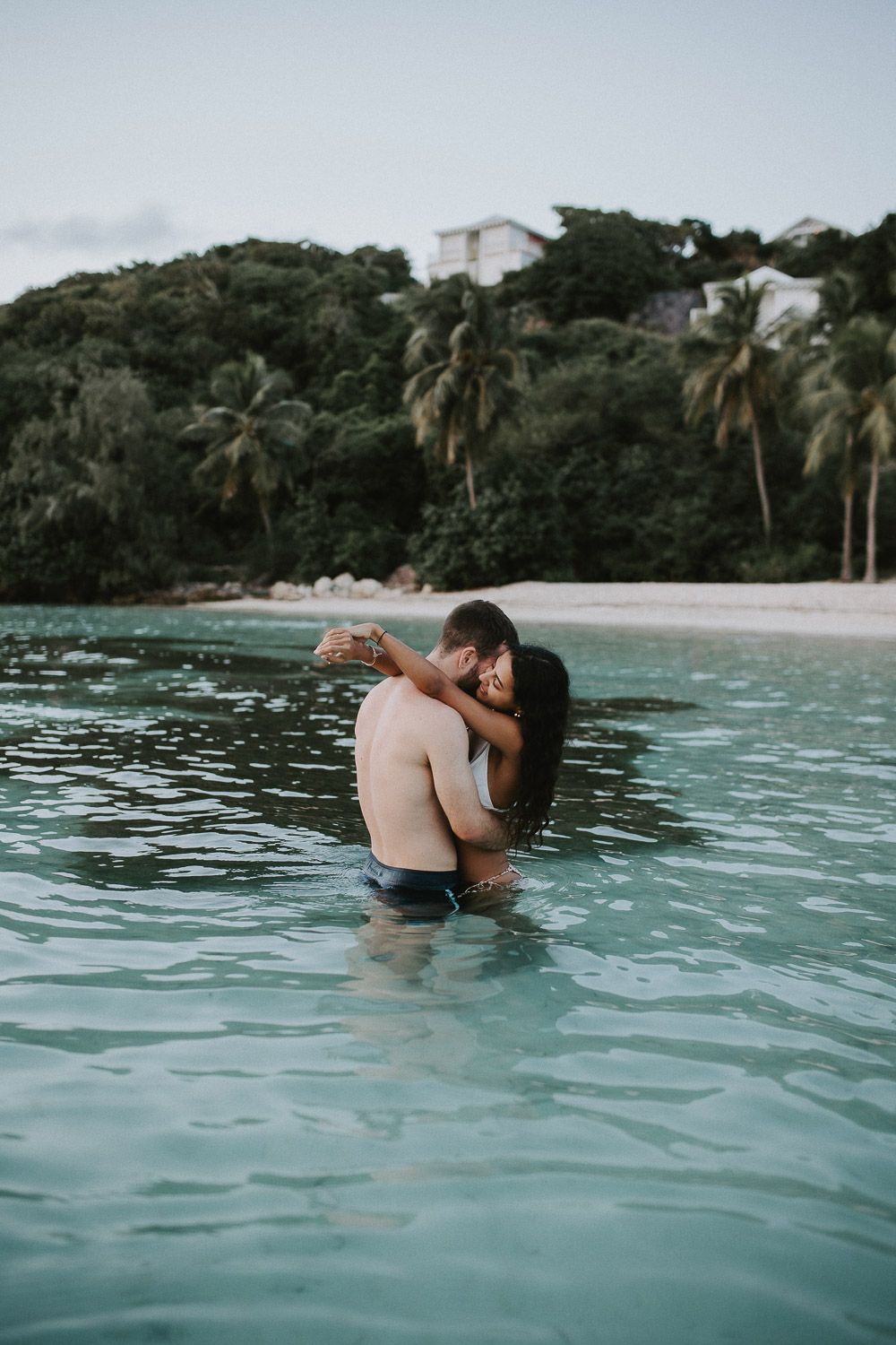 Couple photoshoot during beach hawaii elopement
