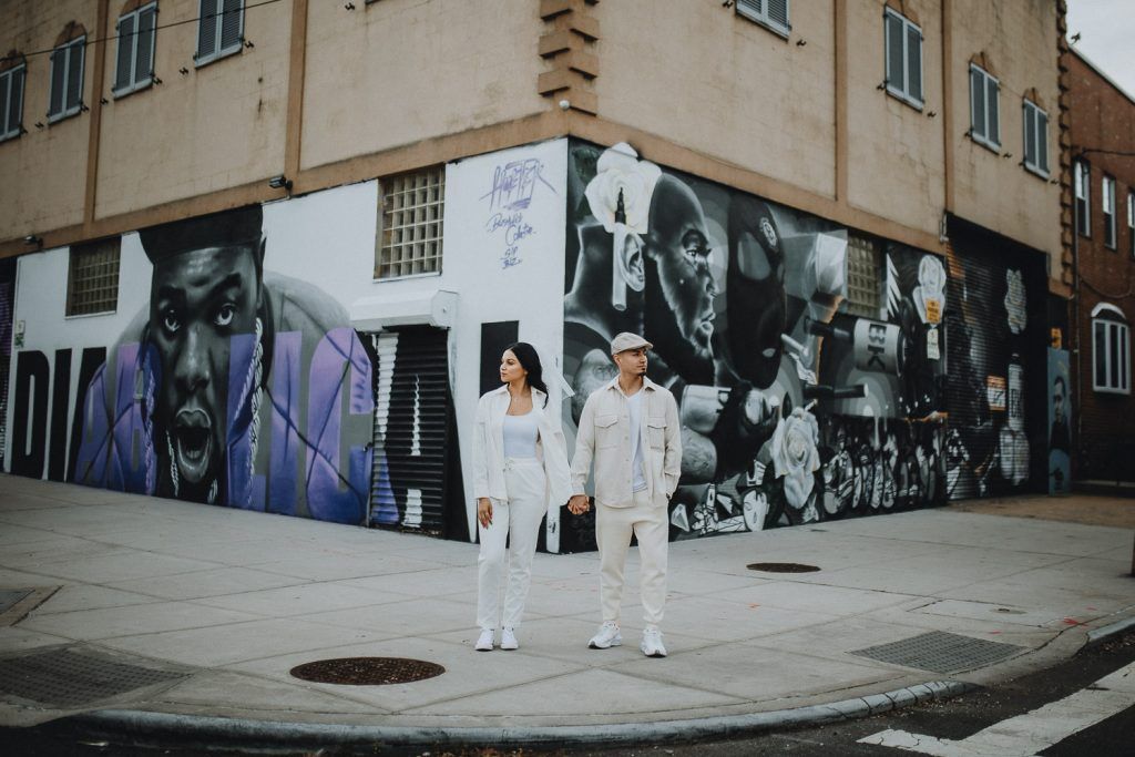 Couple during urban elopement in east williamsburg brooklyn