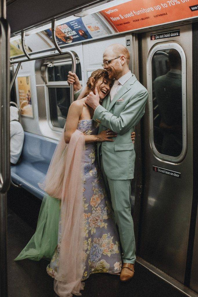 Bride and groom in nyc subway - by Lucie B. Photo brooklyn wedding photographer