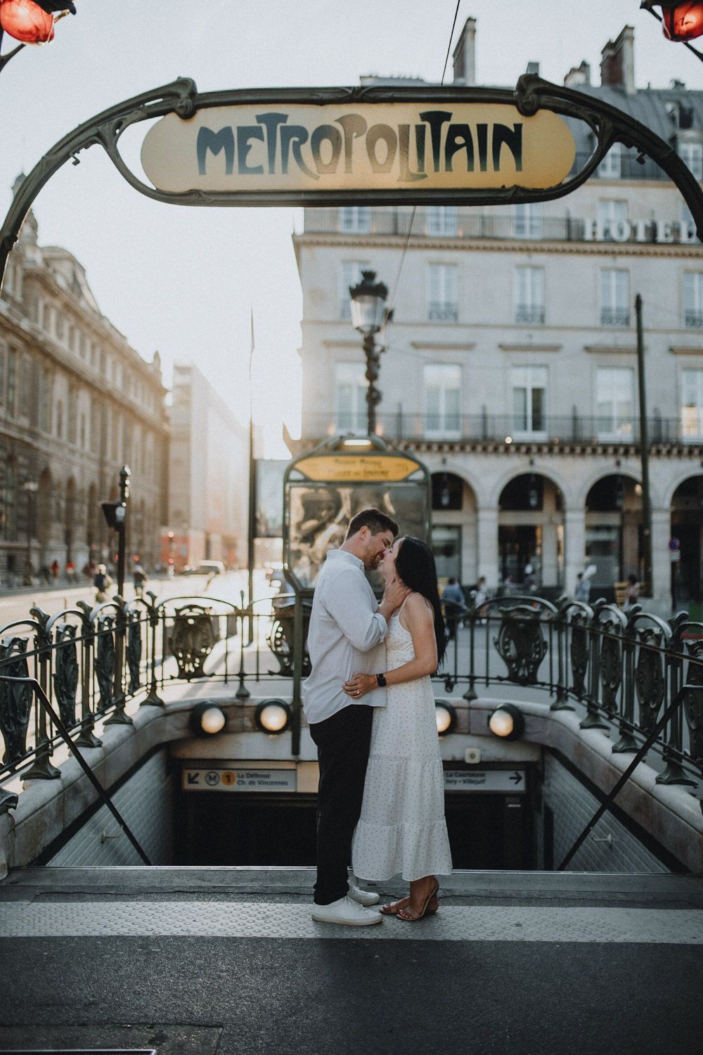 Couple during Paris engagement photoshoot at old subway station