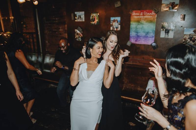 LGBTQ wedding of two brides in brooklyn restaurant