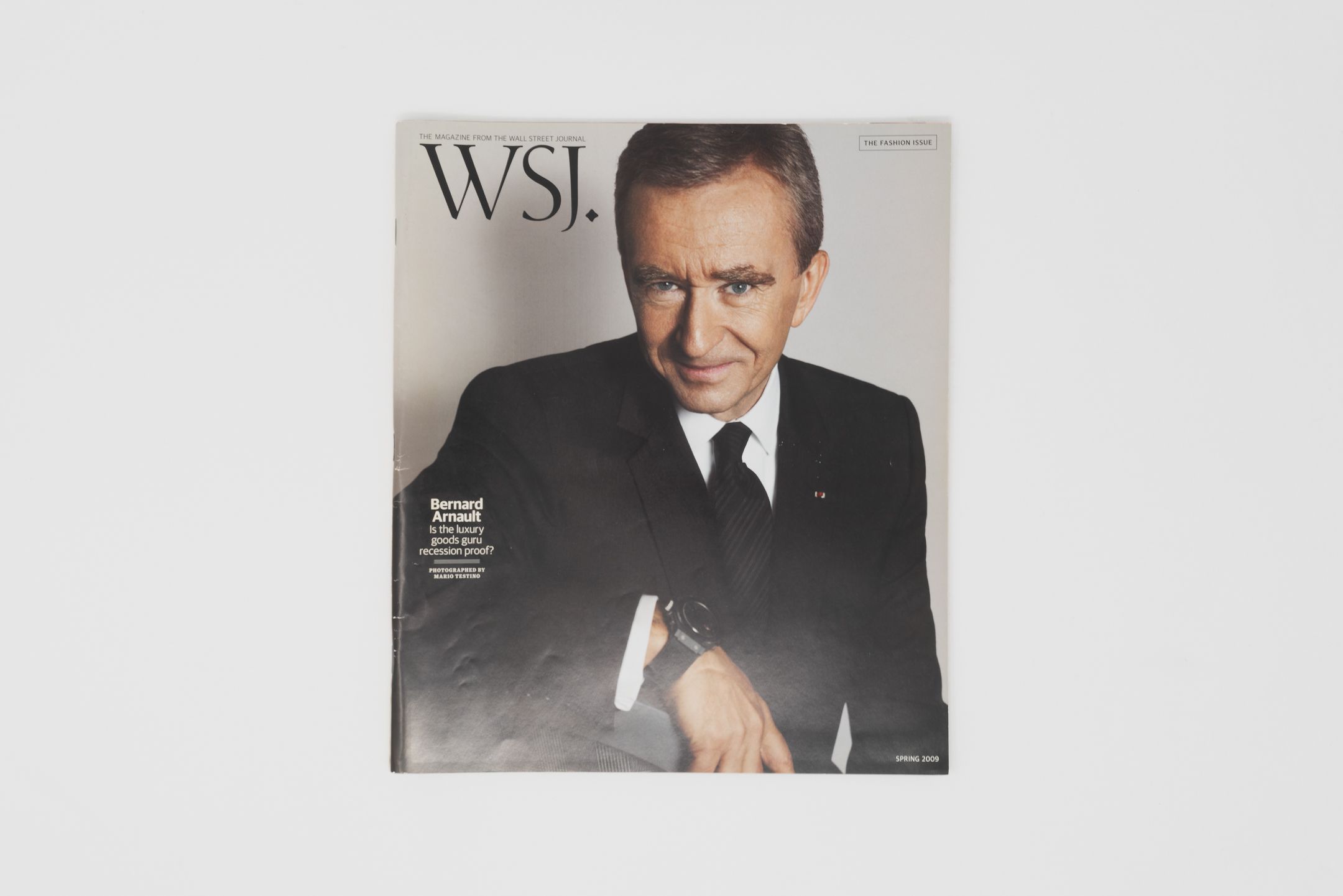 Bernard Arnault looks like he's wearing a quality suit and tie on the cover  of Wall Street Journal magazine. According t…