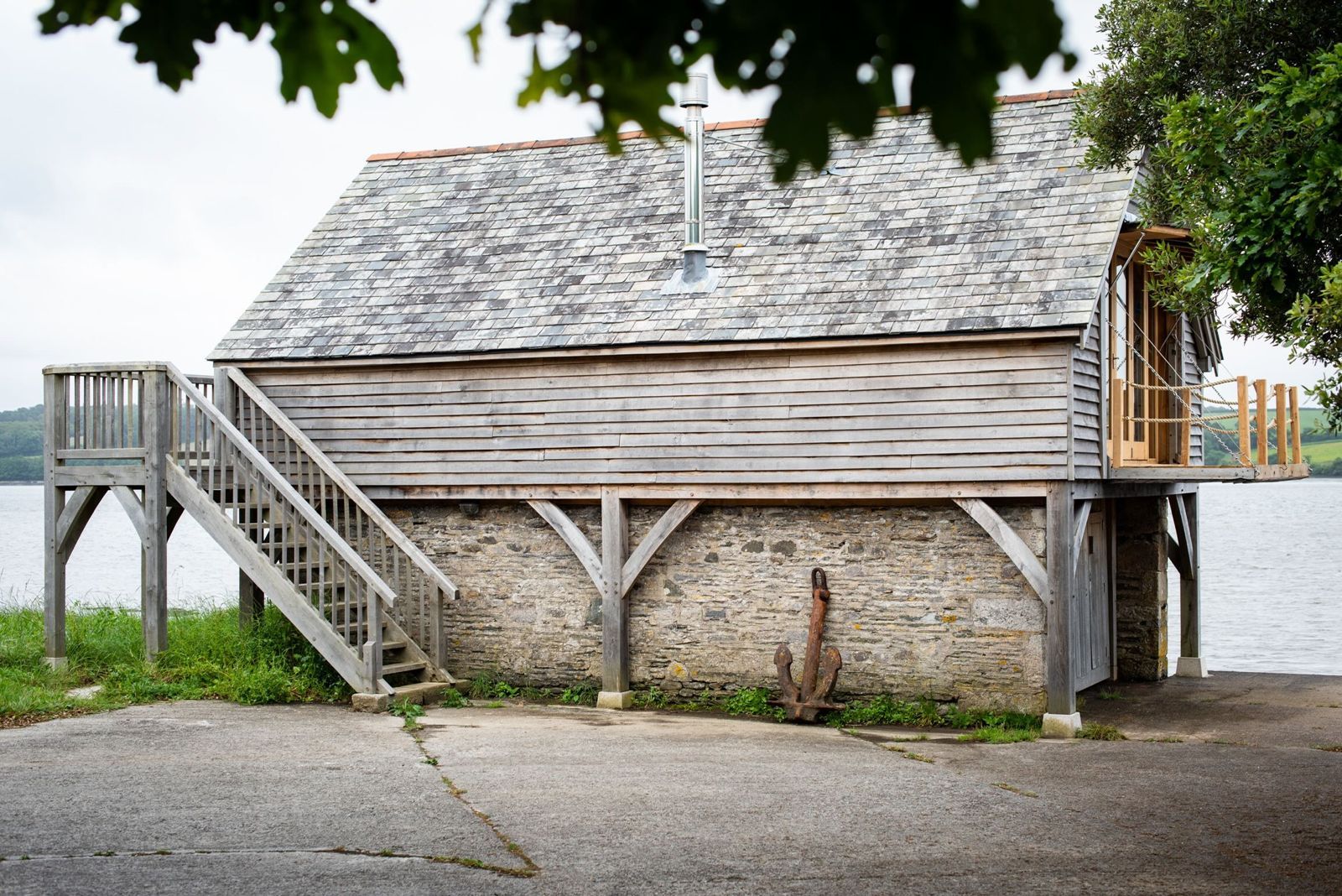 The boathouse on the water's edge at Ince