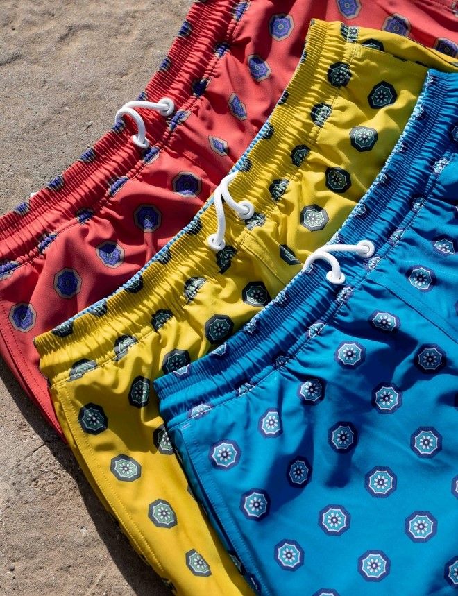 laydown of mens swim trunks