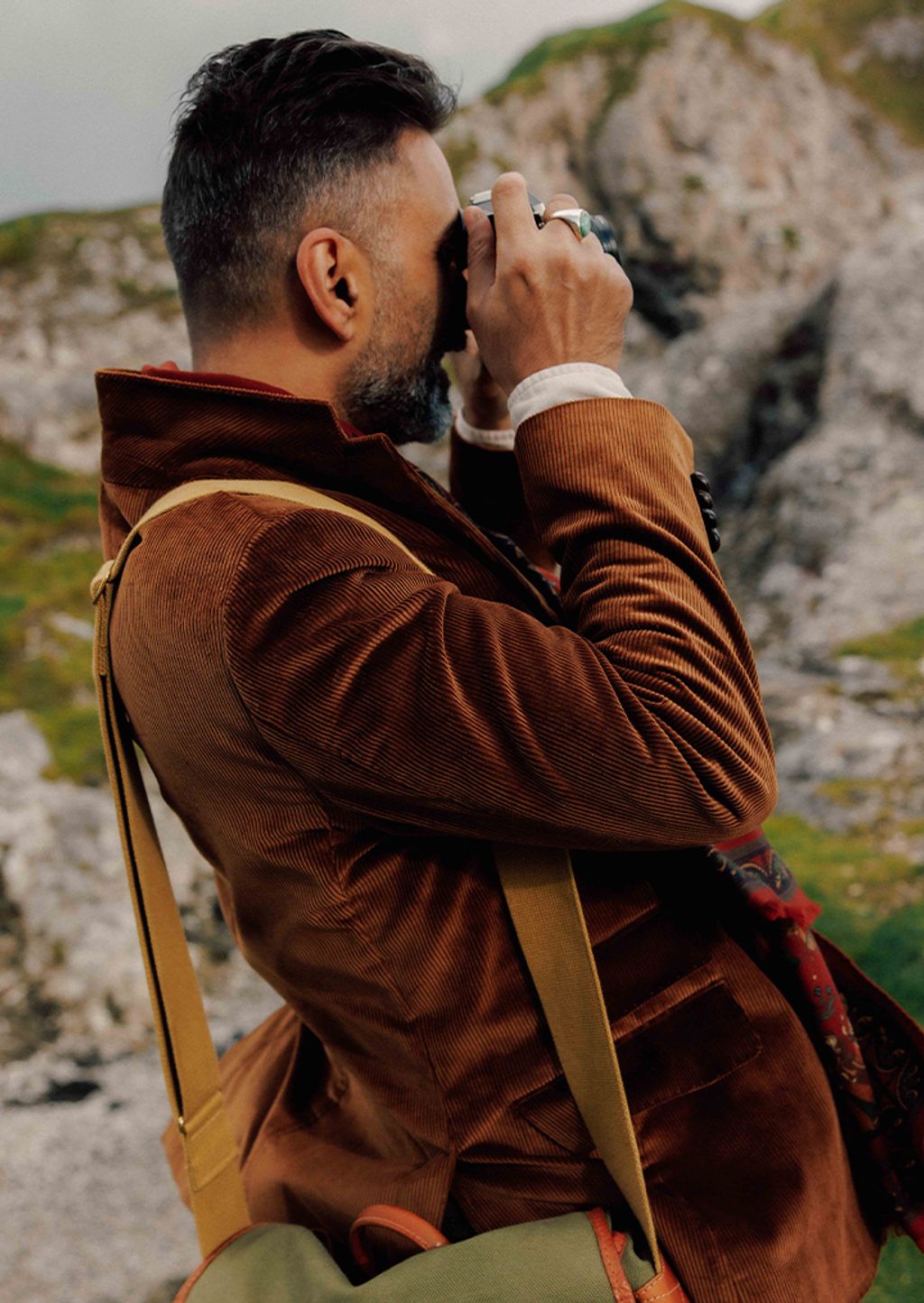 Man in brown blazer 