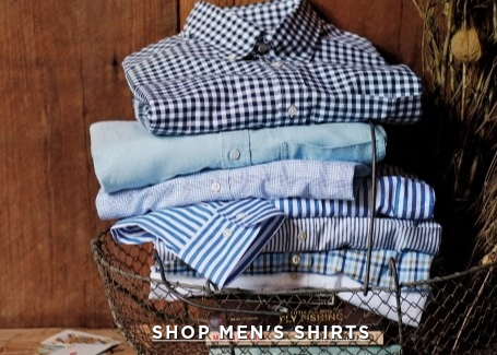 stack of mens sport shirts in stripes, ginghams and plaid