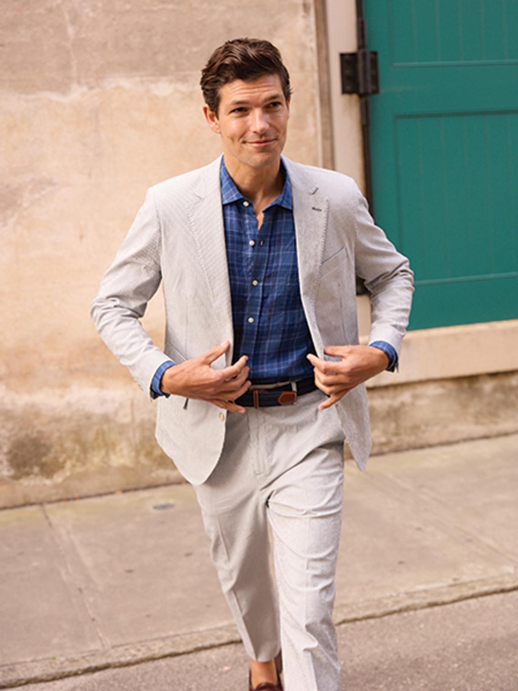 Male model in seersucker suit and plaid shirts