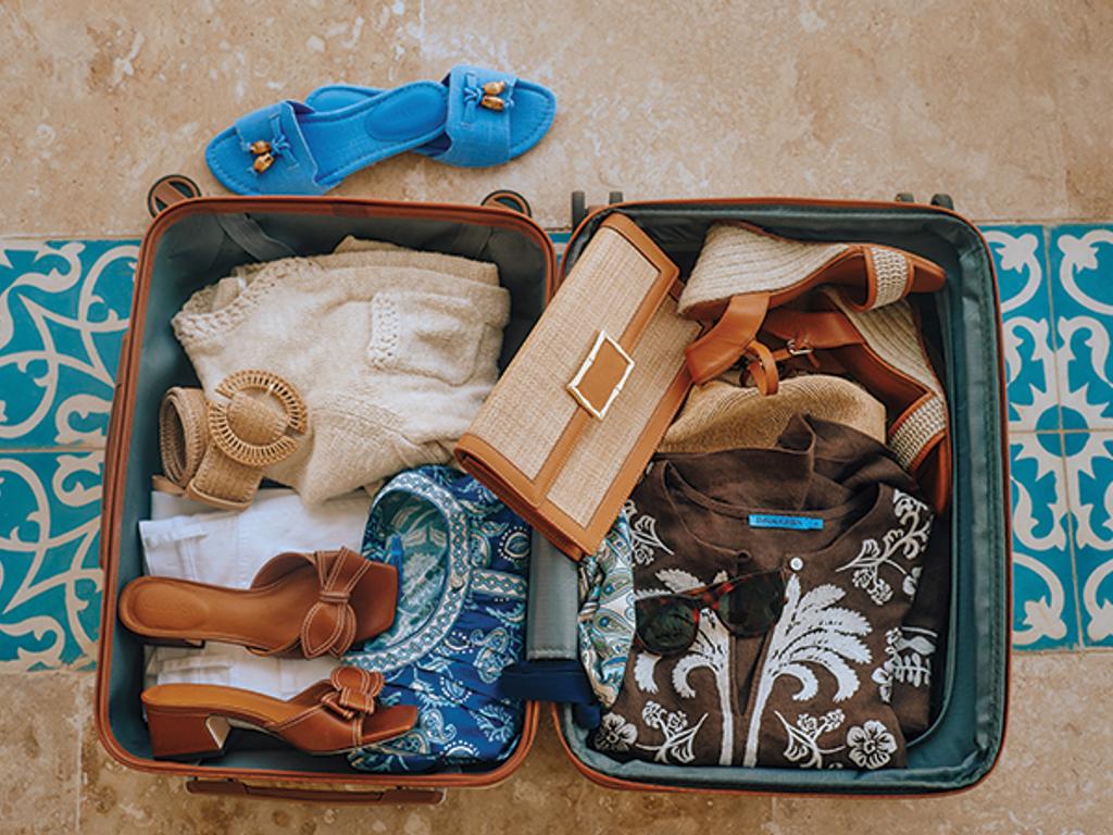 Flatlay of packed suitcase