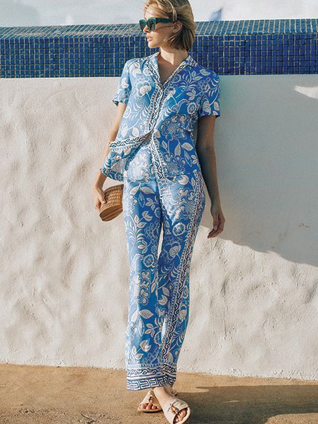 Model in blue floral matching set