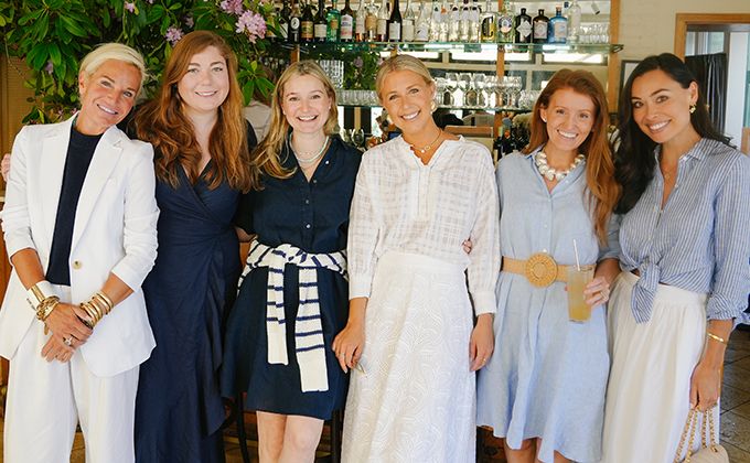 Group of women in blue and white 