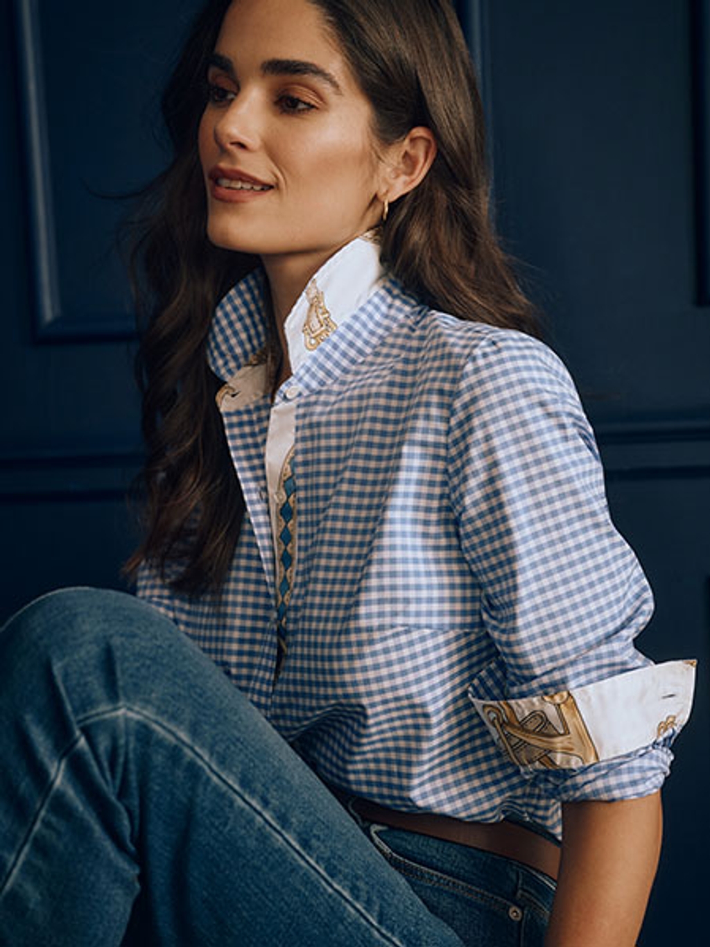 Model in gingham shirt with jeans