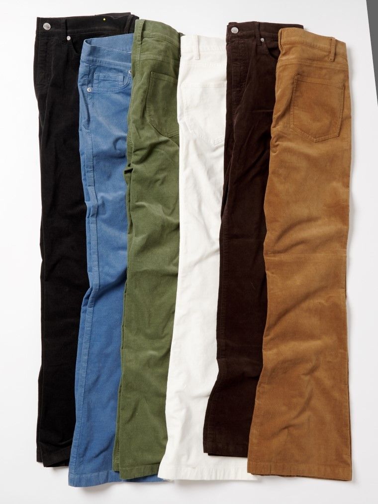 Six pairs of corduroy pants in black, blue, olive green, white, dark brown, and tan.