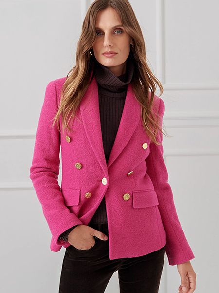Photo of female in pink blazer