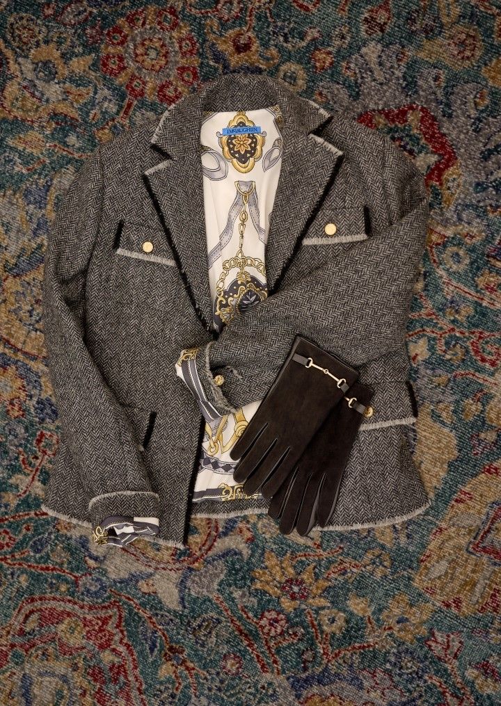 laydown of herringbone jacket with equestrian pattern silk lining