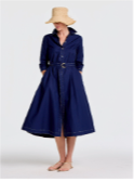 Woman in a navy denim shirtdress with a straw hat.