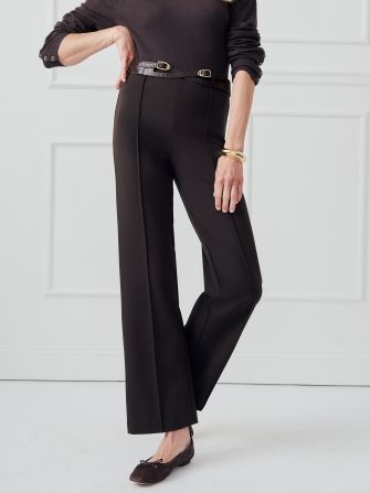 woman wearing chocolate brown wide leg pant with seam down the front