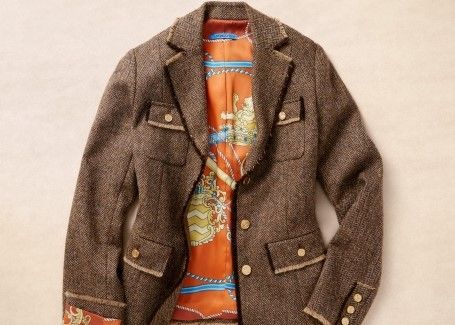 laydown of womens brown houndstooth utility style jacket with orange silk equestrian pattern lining
