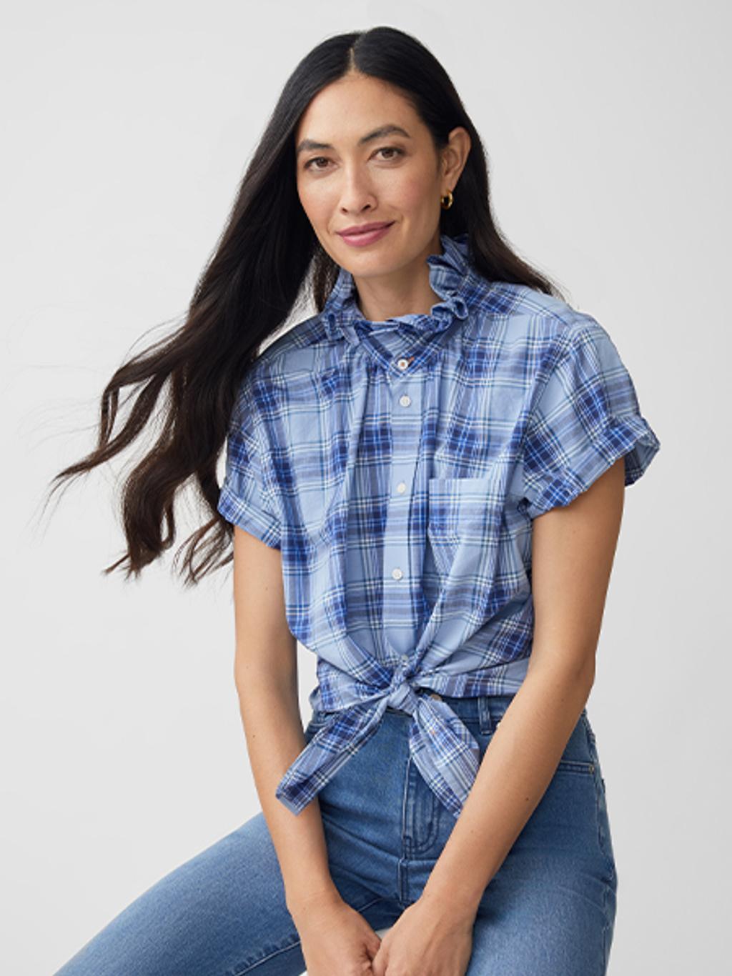 Model wearing limited-edition J.McLaughlin x KMJ shirt with slim fit jeans.