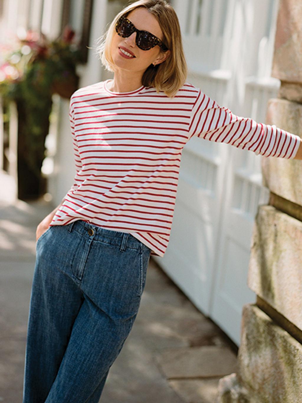 Model in striped tee and jeans in Charleston