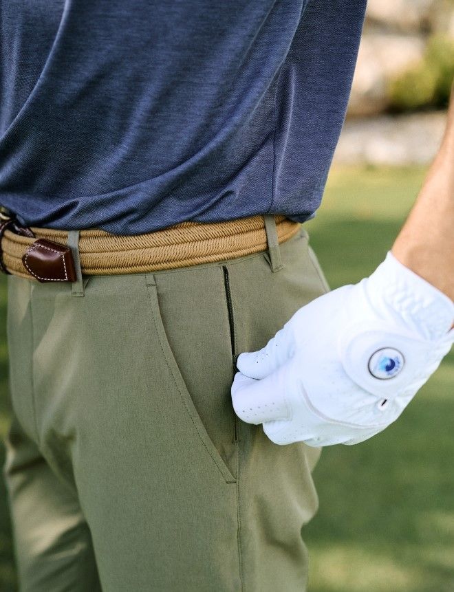 close up image of men's olive golf performance pants