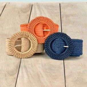 trio of orange, natural and navy grasscloth belts on pool deck