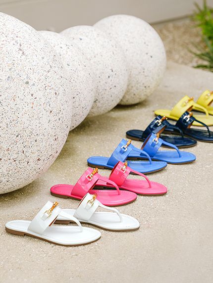Women's colorful sandals in a row
