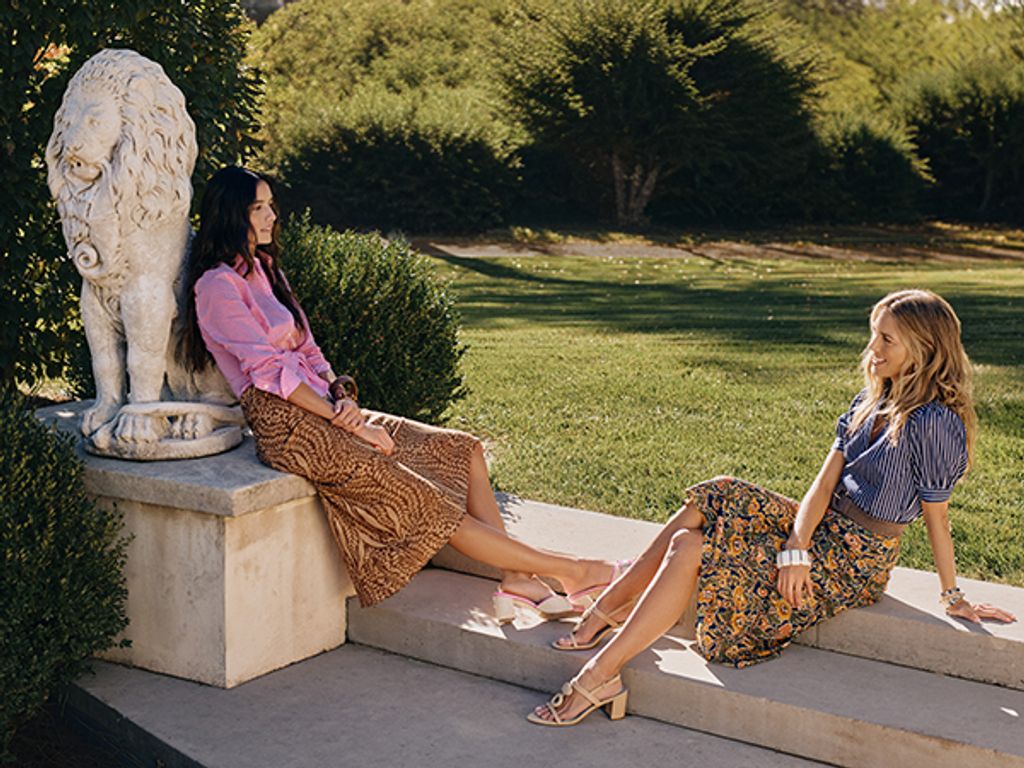 Models sitting together on our steps