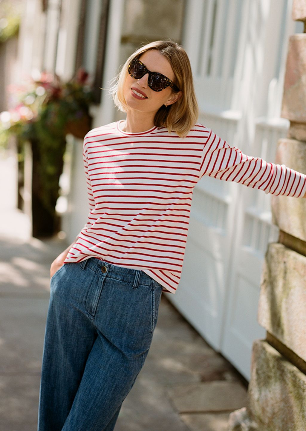 Model in striped tee and jeans